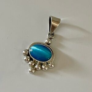 Vintage, Bold Polished Sky Blue Glass Cat's Eye Slider Pendant